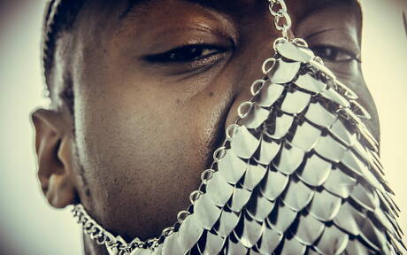 Black superstud Deep Dic posing nude and showing nice butt outside