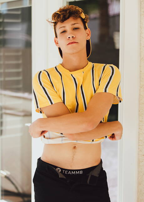 American young Hayden Lee get naked and showing tight butt