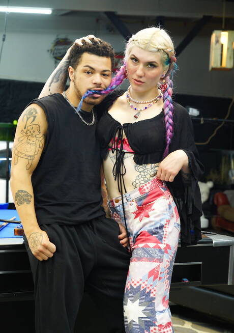 Two young guys - Johnny and Malakai fuck blonde shemale and each other in garage