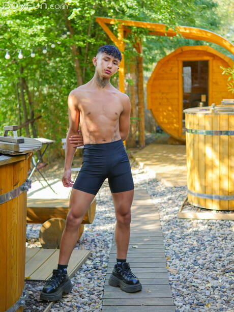 Young boy Archi Gold shows a beautiful body outside