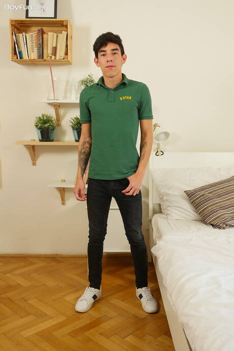 Latino young Roman Capellini undressing and showing tight butt