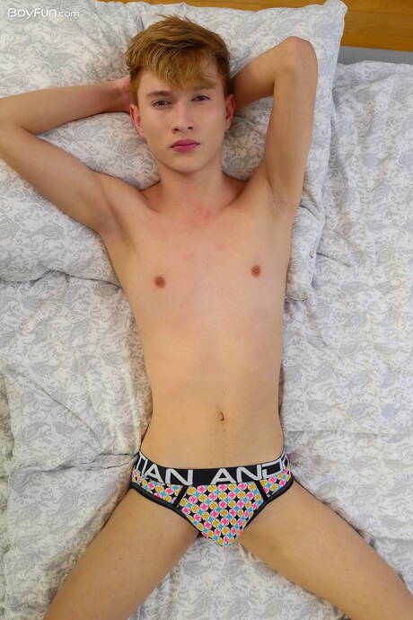 Young Angel Rivers undressing and showing hot ass